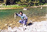 Shji showing off his Rocky Mountain cutthroat trout.